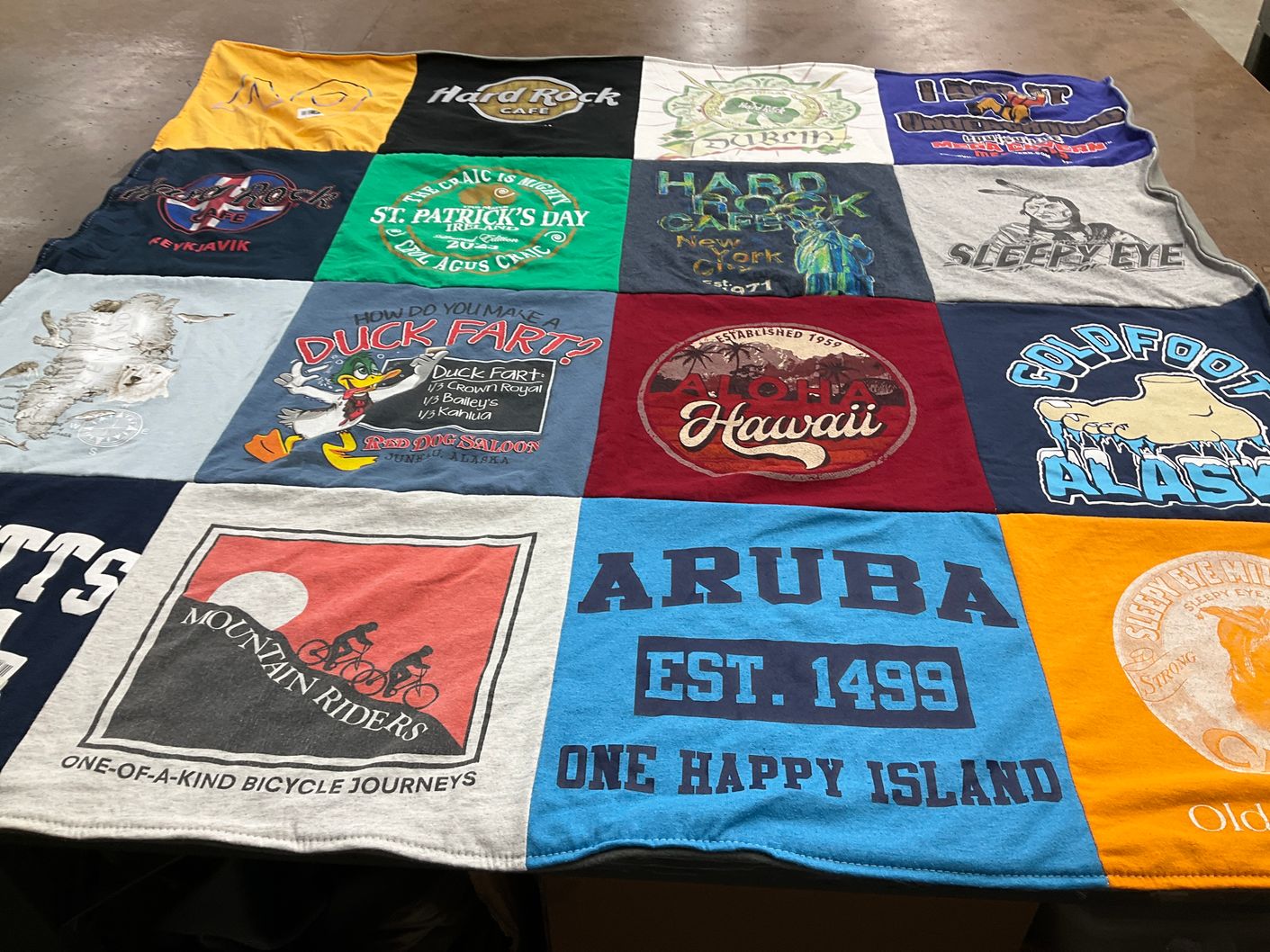 T-shirt quilt with travel, bicycling themes by Stacey from NV