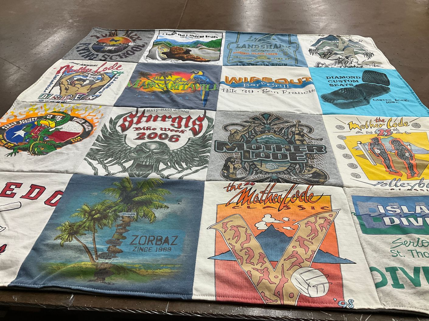 T-shirt quilt with motorcycling, beach themes by Calvin from IA