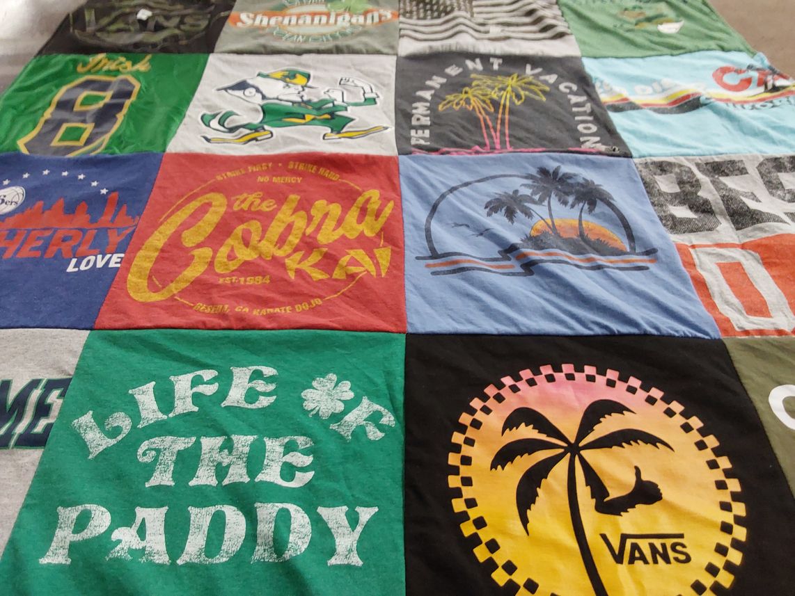 T-shirt quilt with karate, vacation themes by Kristin from PA