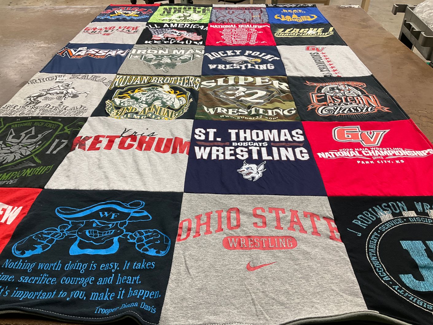 T-shirt quilt featuring st. thomas bobcats wrestling by Stephanie from NY