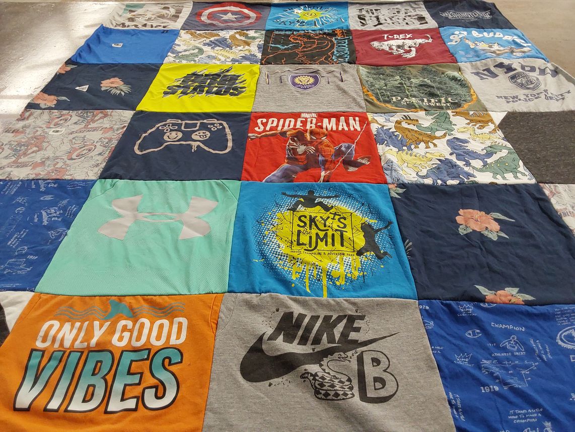 T-shirt quilt with video games, superheroes themes by Phyllis from KY