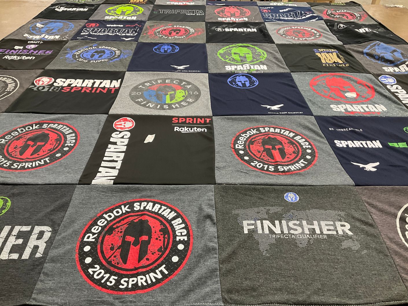 T-shirt quilt with fitness, obstacle course racing themes by Anthony from IL