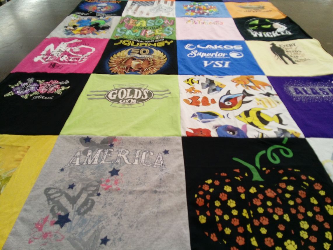 T-shirt quilt with fitness, travel themes by Connie from CA