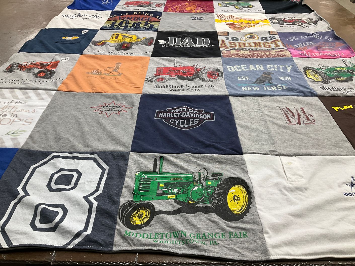 T-shirt quilt with farming, motorcycles themes by Carolyn from PA