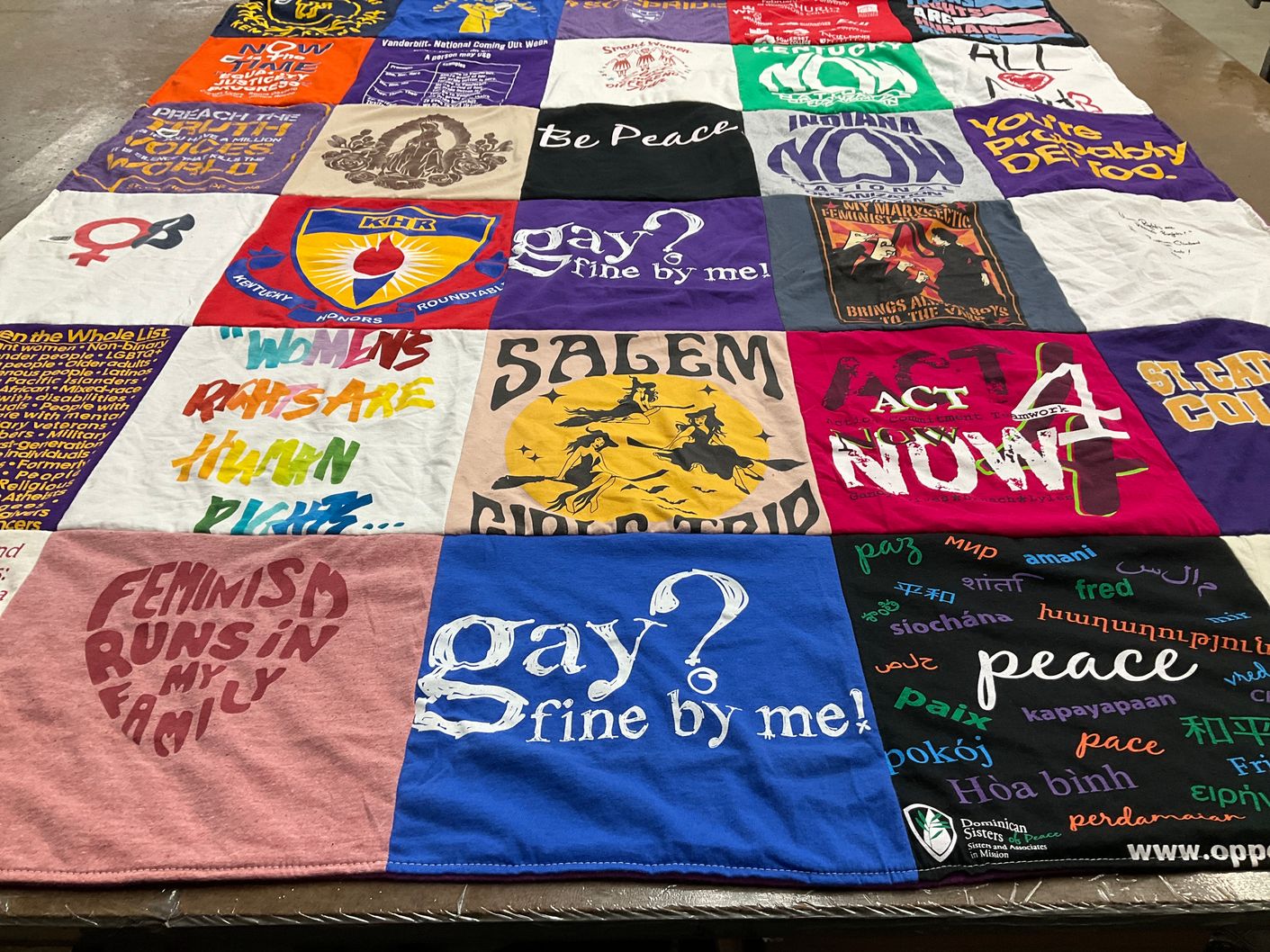 T-shirt quilt with social justice, lgbtq rights themes by Tara from KY
