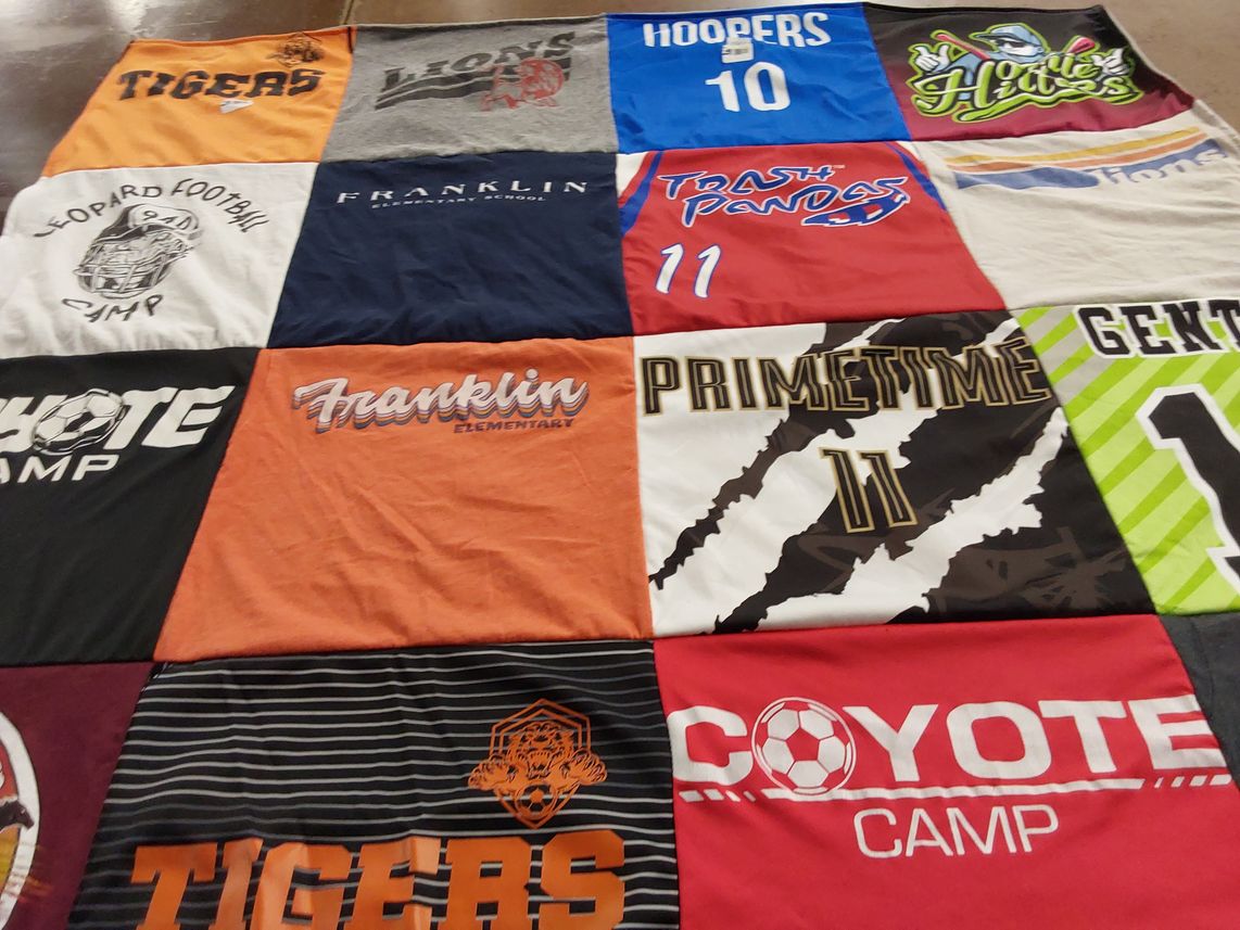 T-shirt quilt with sports, youth programs themes by Brandon from TX