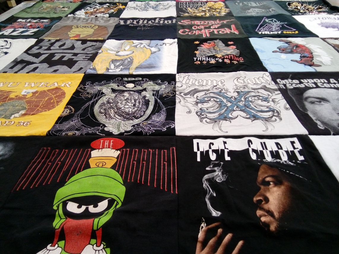 T-shirt quilt with music, comedy themes by Dorothy from VA