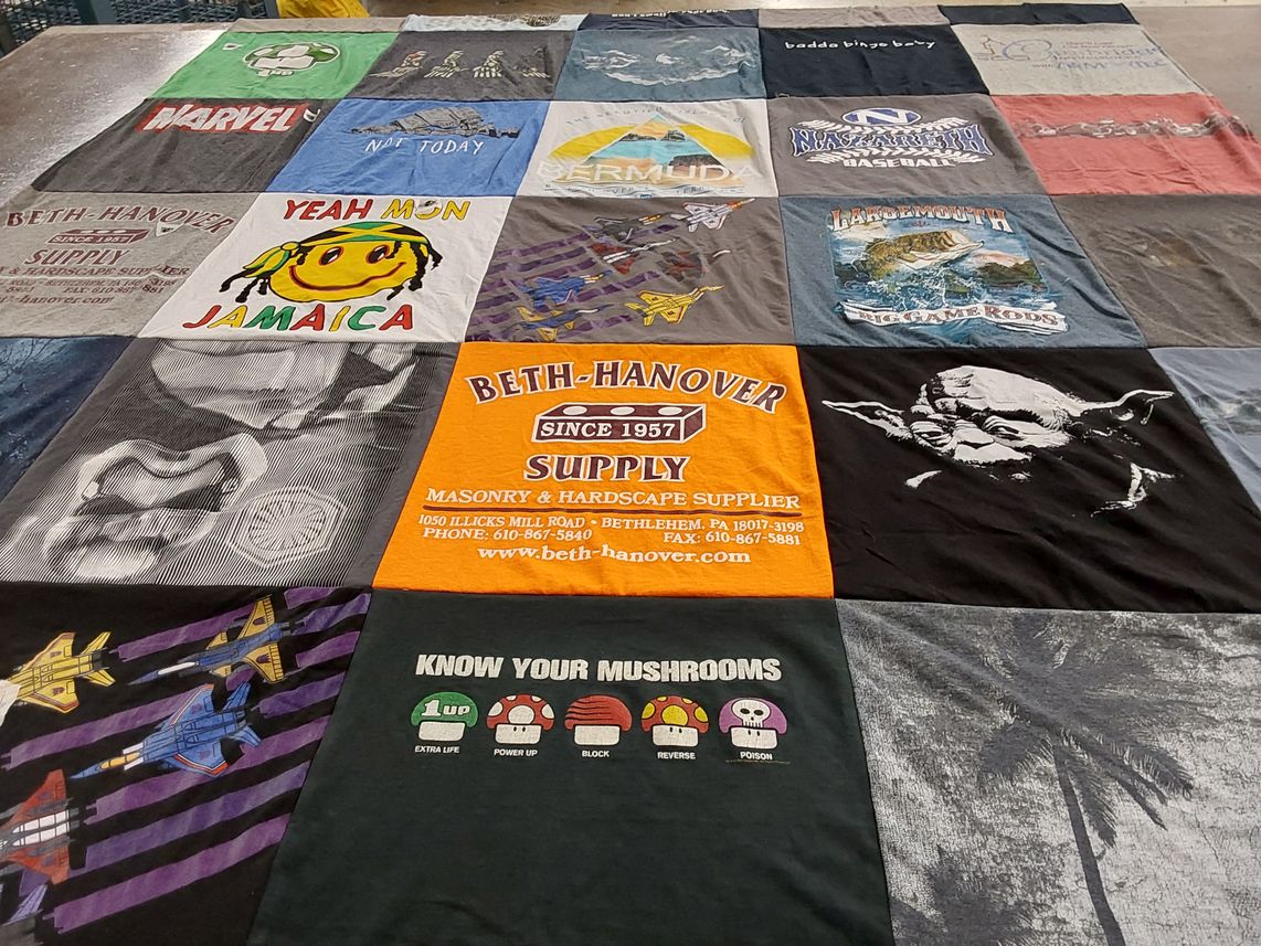 T-shirt quilt with superheroes, gaming themes by Stacy from PA