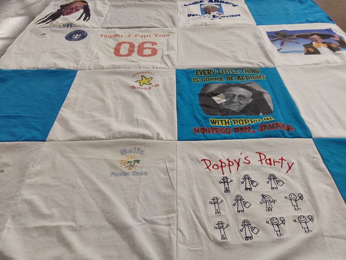 T-shirt quilt with travel, parties themes by Amy from MA