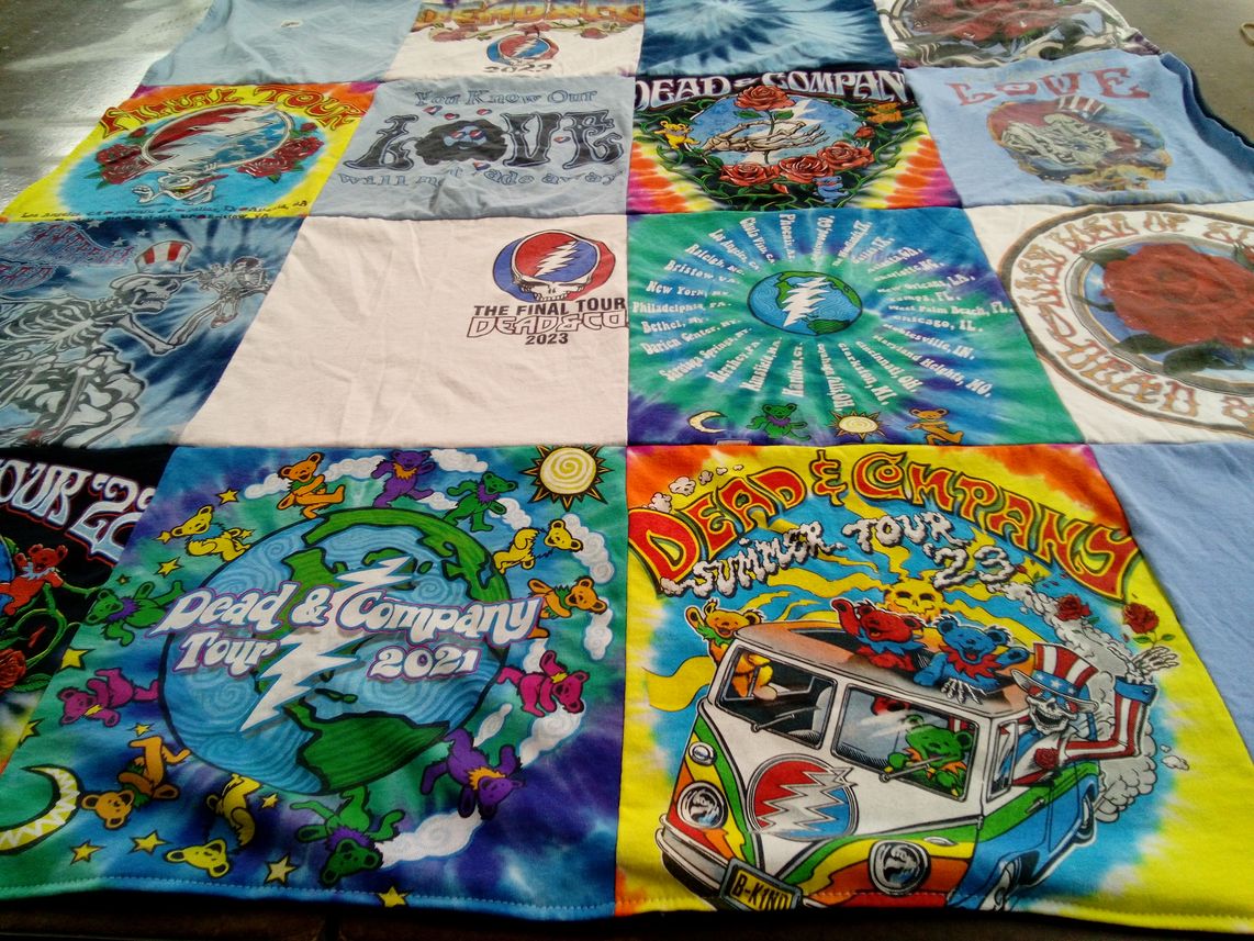 T-shirt quilt with music, concerts themes by Carol from IN