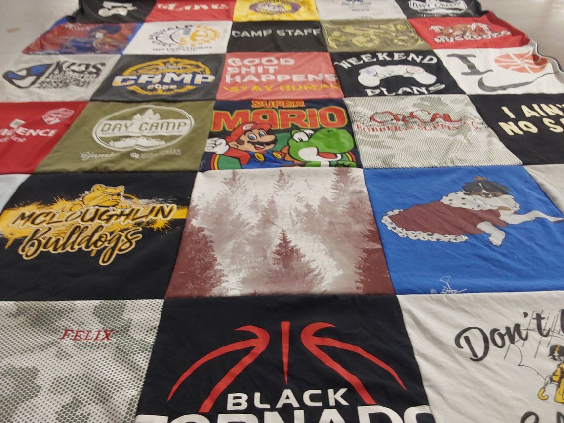 T-shirt quilt featuring mcloughlin bulldogs, black tornadoes by Tobi from OR