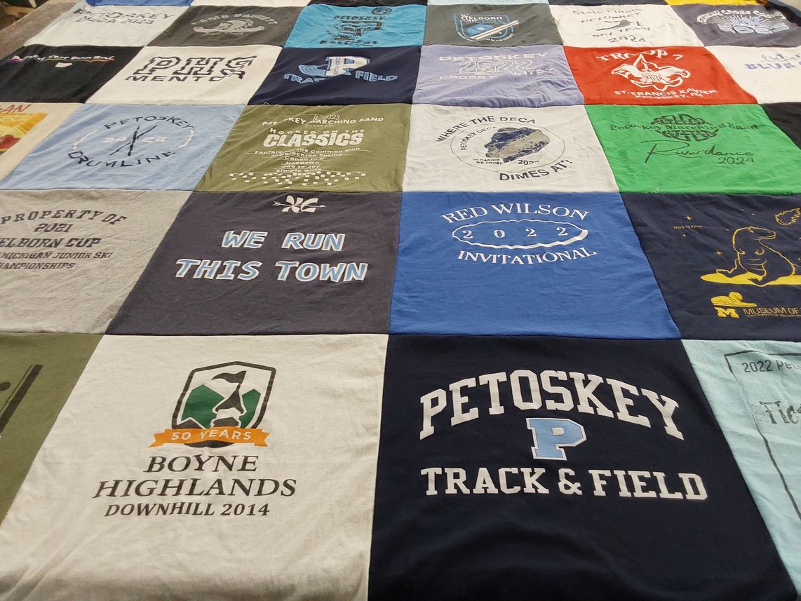 T-shirt quilt featuring petoskey track and field by Jennifer from MI