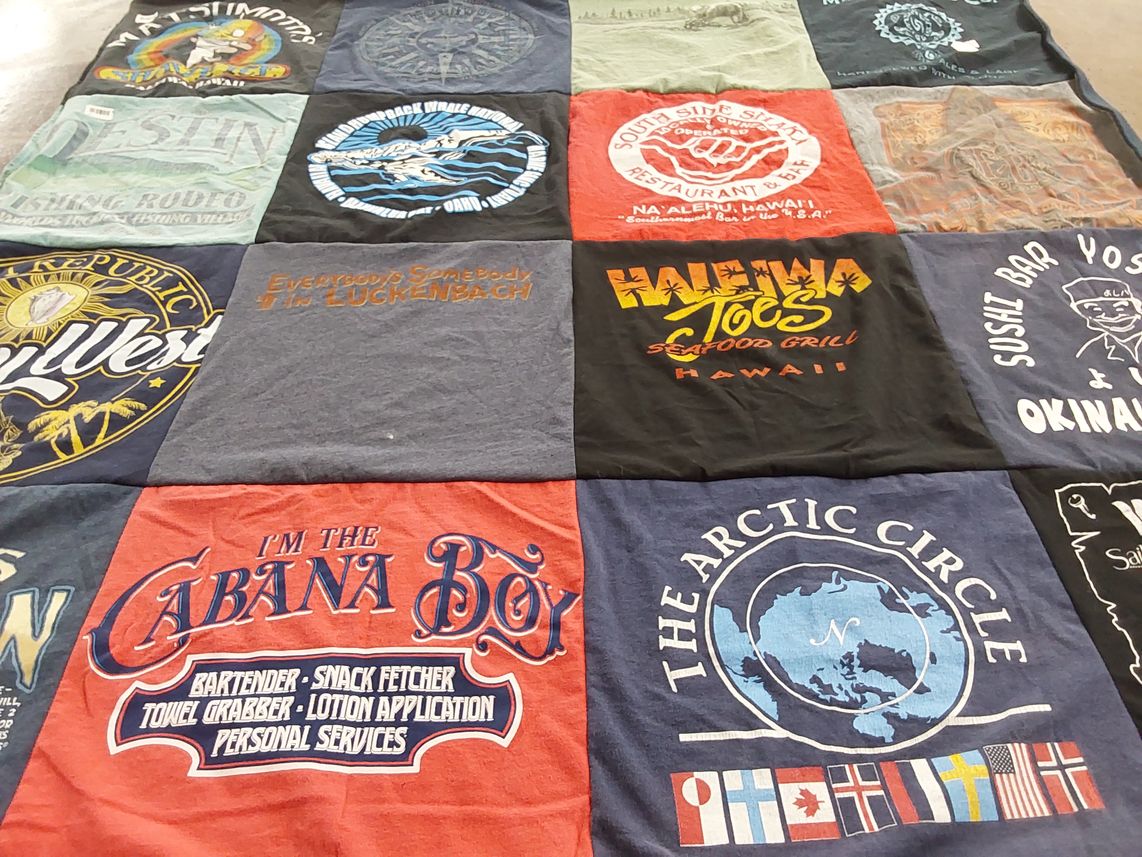T-shirt quilt with fishing, food themes by Barbara from FL