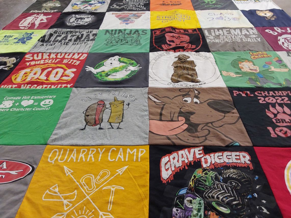 T-shirt quilt with elementary education, character building themes by Lindsay from CA