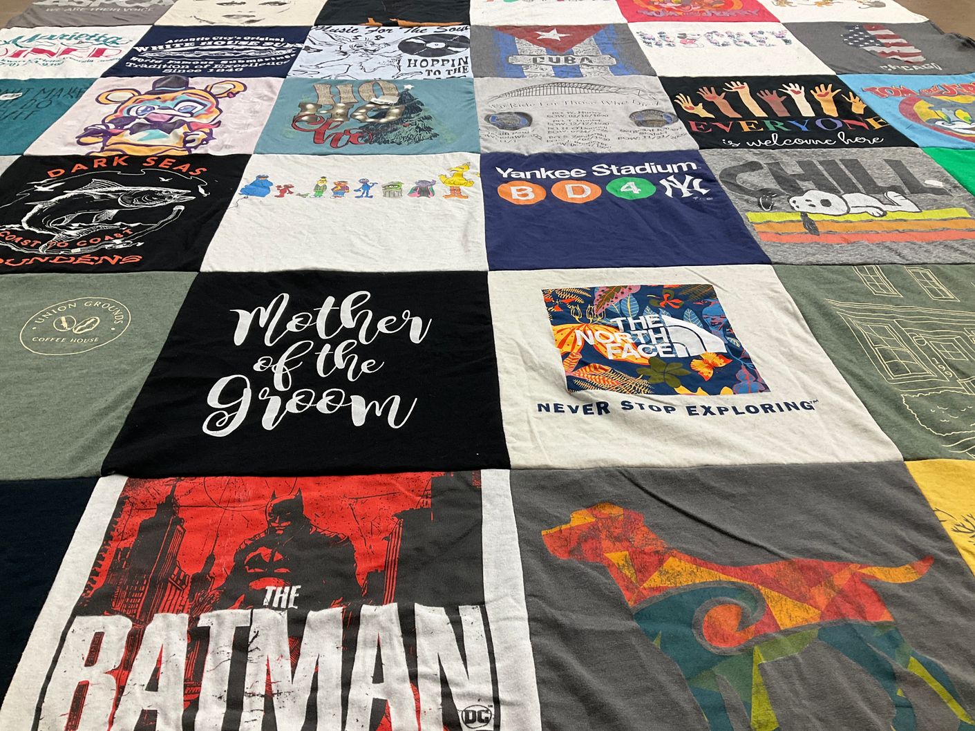T-shirt quilt with exploring, hiking themes by Angelina from NJ