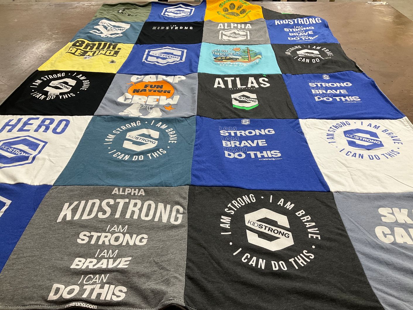 T-shirt quilt with personal development, youth empowerment themes by Cynthia from LA
