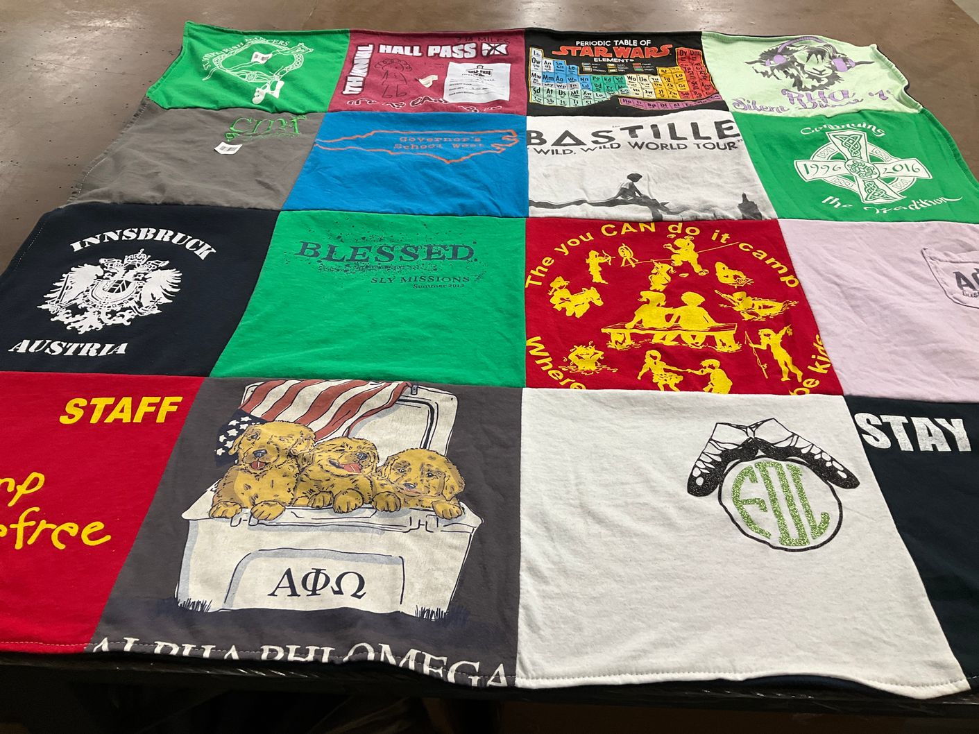 T-shirt quilt with travel, music themes by Jill from NC