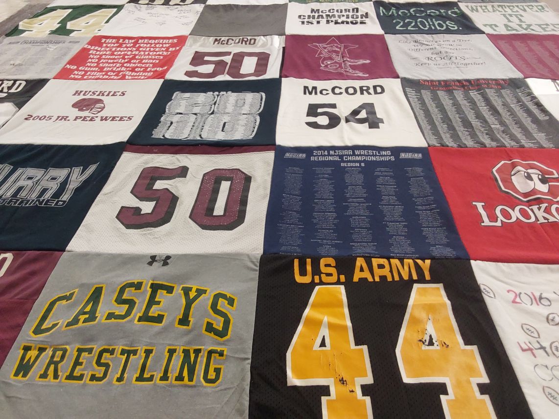 T-shirt quilt featuring caseys wrestling by Ann from NJ