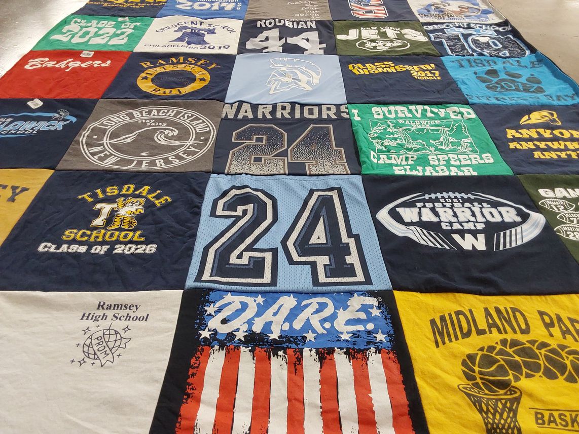 T-shirt quilt featuring warriors, jets by Amy from NJ