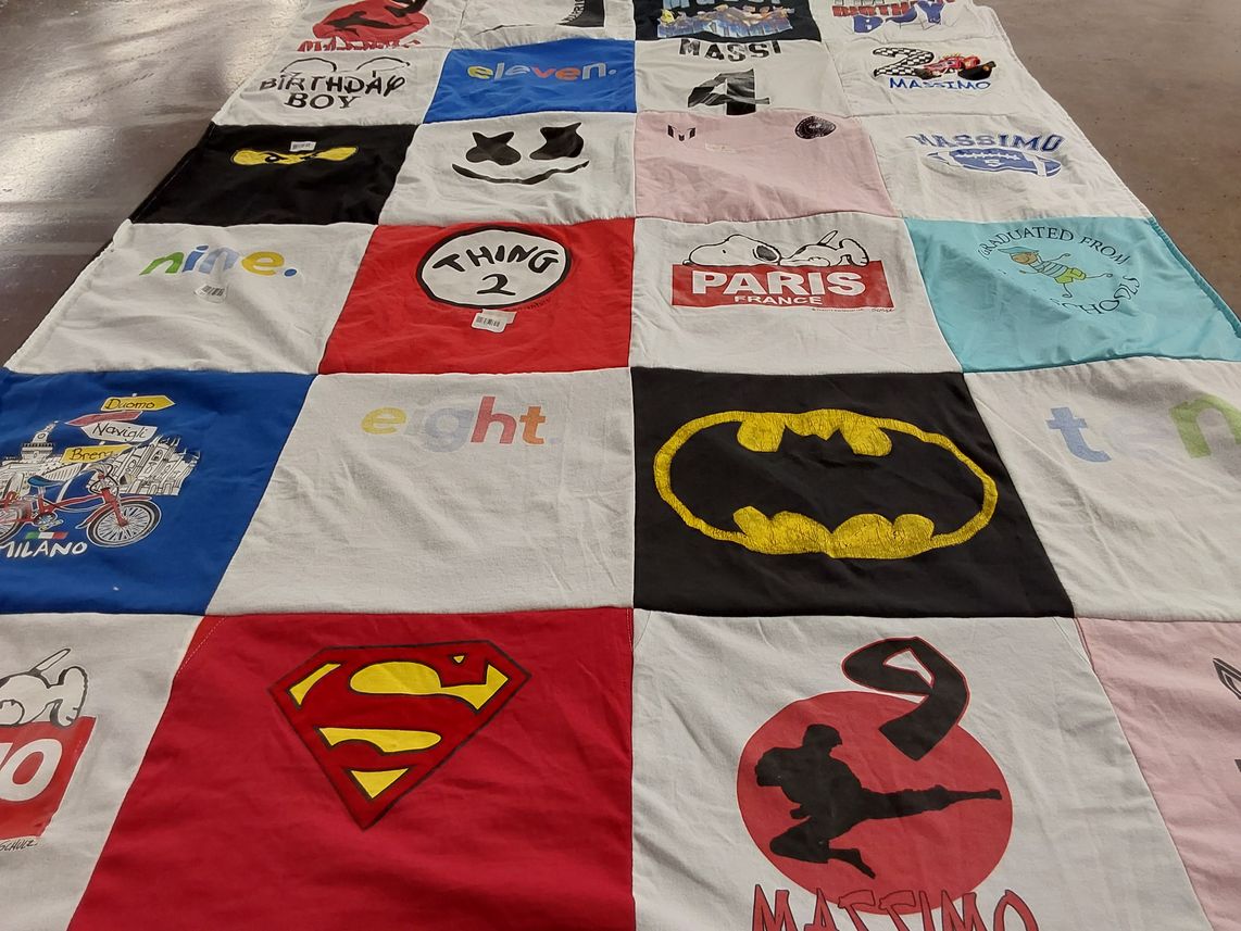 T-shirt quilt with superheroes, celebrations themes by Martha from FL