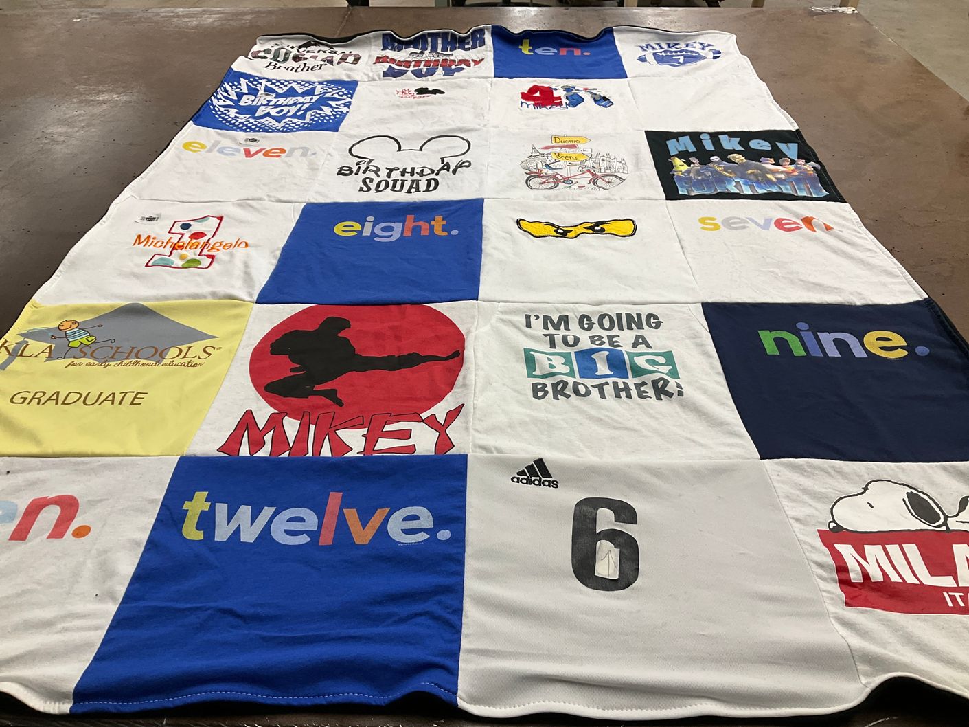 T-shirt quilt with birthdays themes by Martha from FL