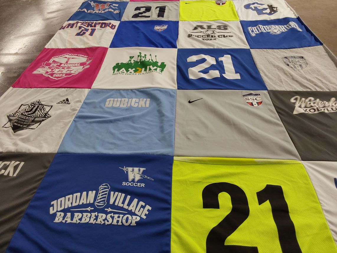 T-shirt quilt featuring ais soccer club, ssc by Janelle from CT