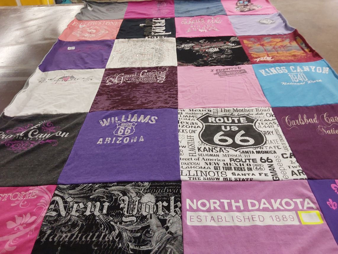 T-shirt quilt with travel, tourism themes by Brenda from KS