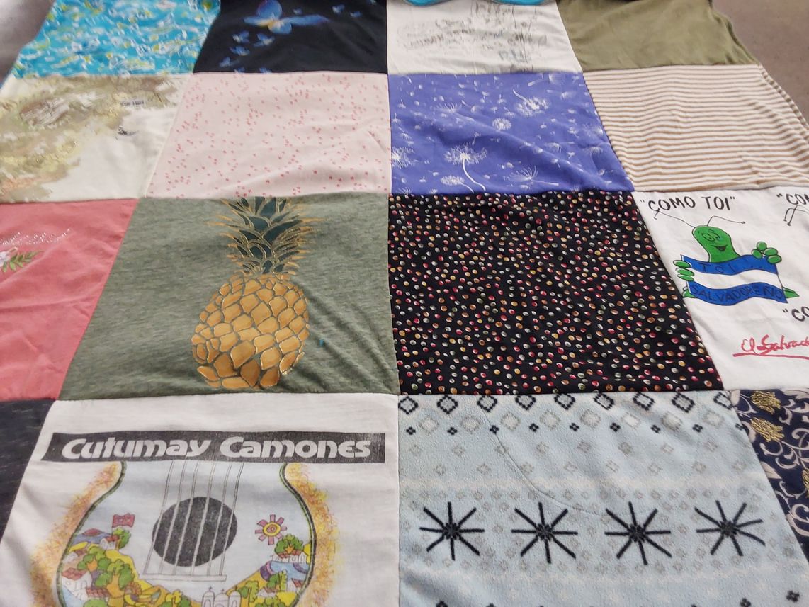 T-shirt quilt with culture, music themes by Marxlina from CA