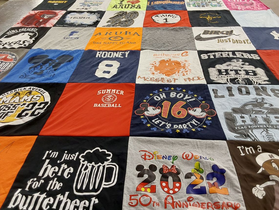 T-shirt quilt with disney, baseball themes by Kimberly from NY