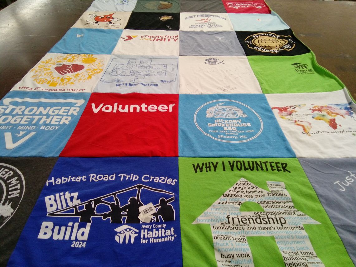 T-shirt quilt with volunteering, community service themes by Ann from KY