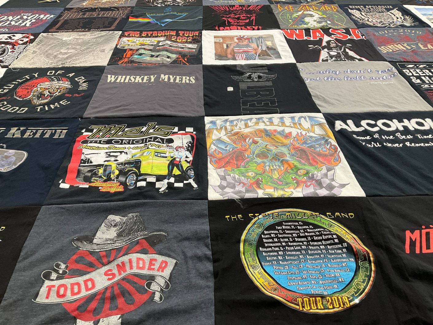 T-shirt quilt with music, bands themes by Kari from NV