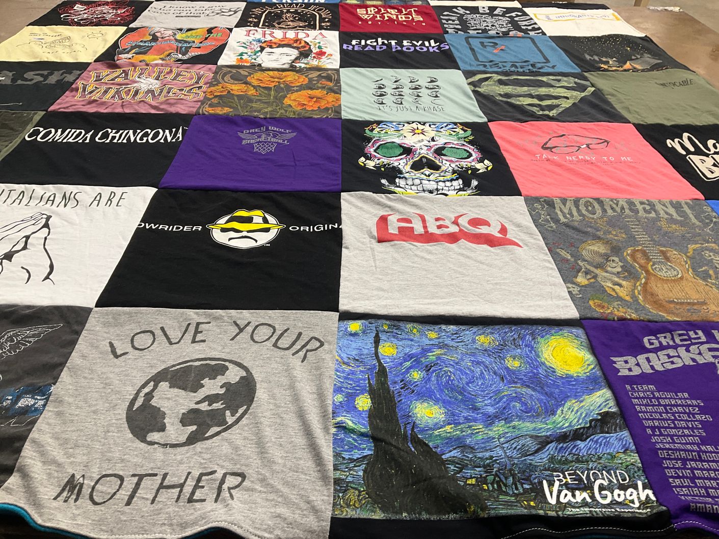 T-shirt quilt with art, cooking themes by Jetta Alison from NM