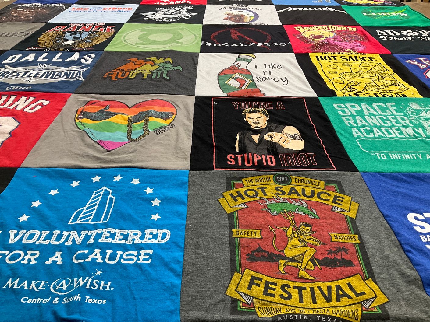 T-shirt quilt with volunteering, cooking themes by Beth from TX
