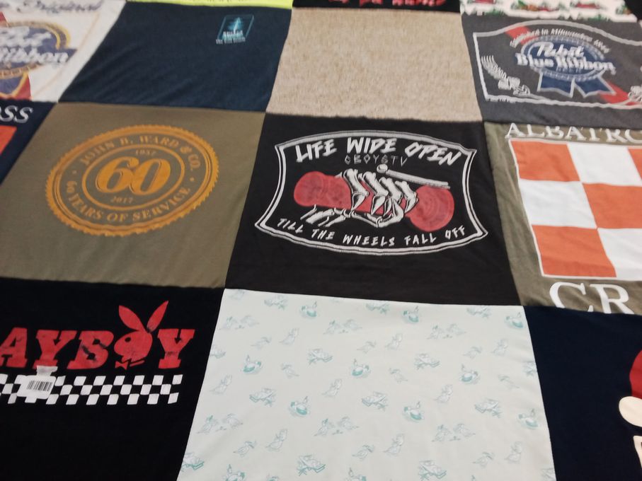 T-shirt quilt with graphic design, entertainment themes by Savannah from DE