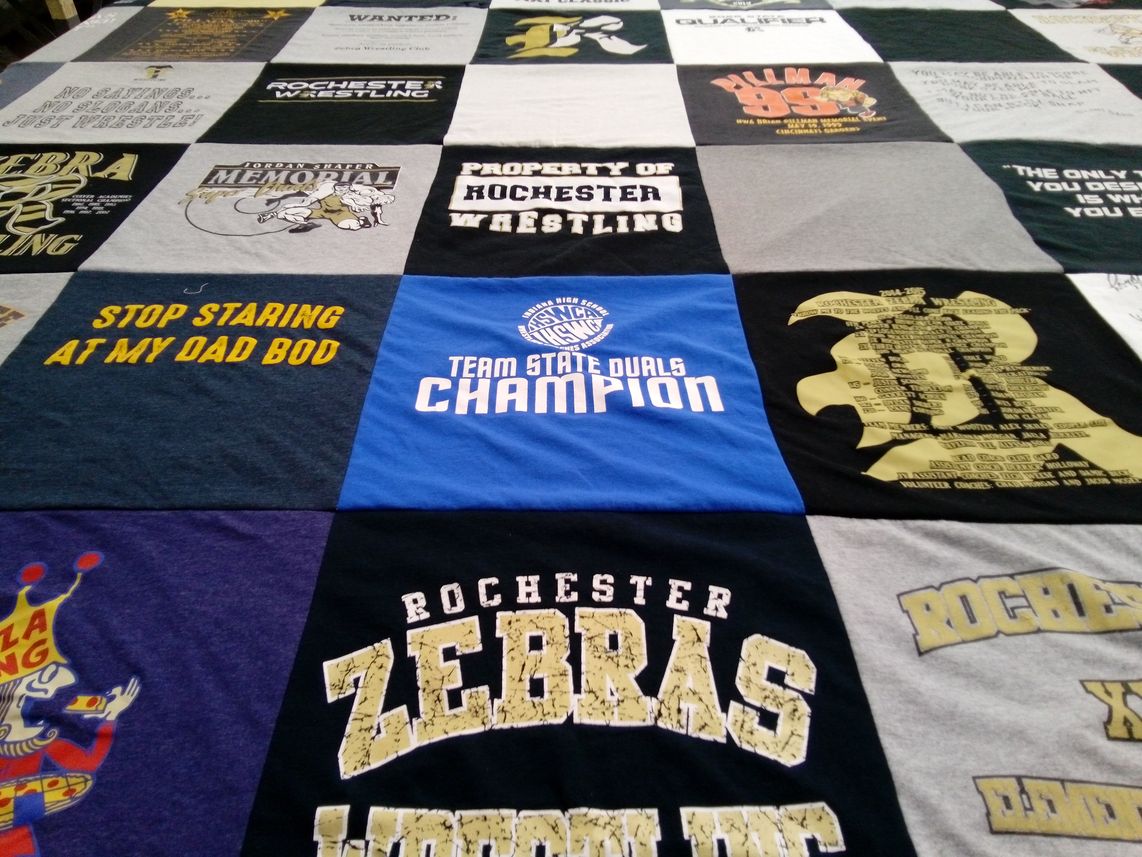 T-shirt quilt featuring rochester zebras wrestling by Clint from IN