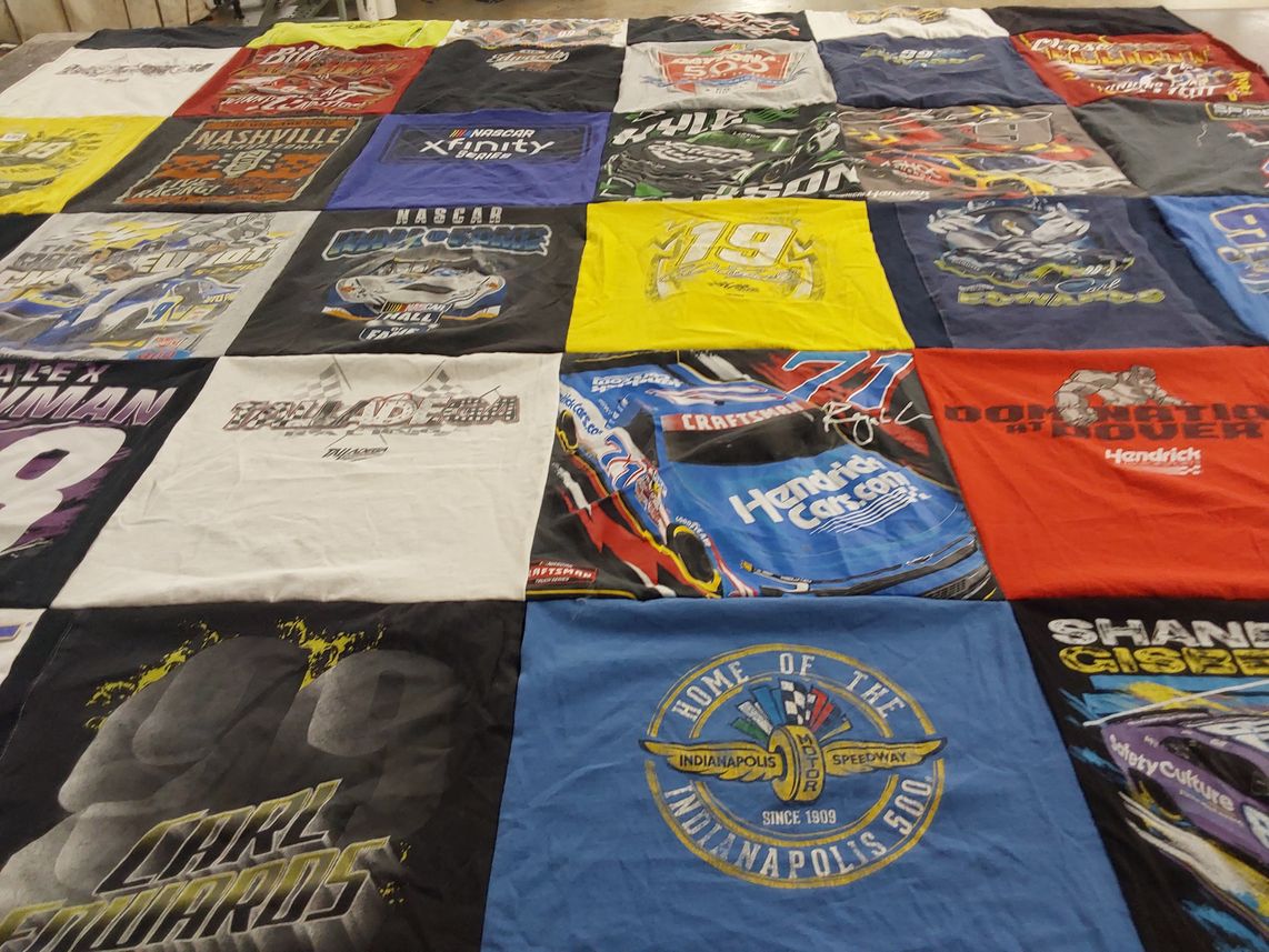 T-shirt quilt with racing, motorsports themes by CarolAnn from MN