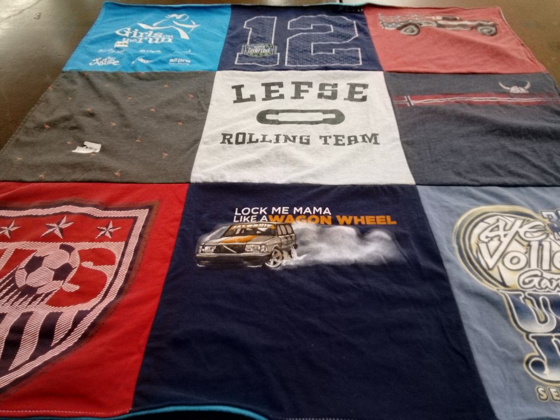 T-shirt quilt with soccer, volleyball themes by Matt from WA
