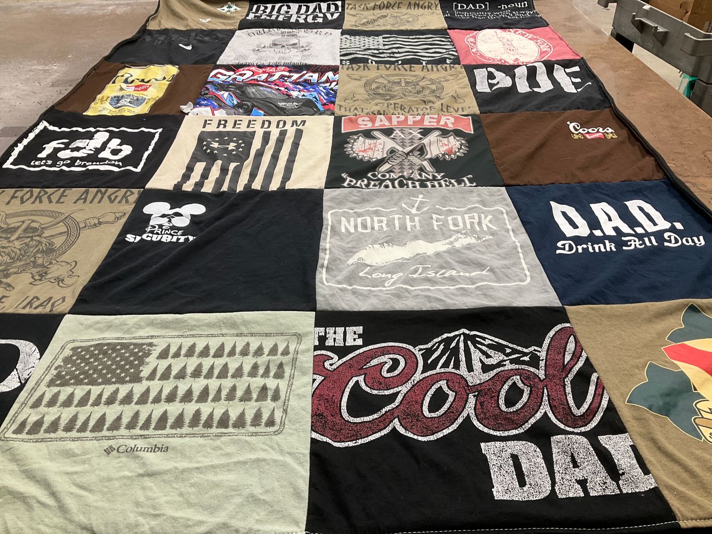 T-shirt quilt with politics, family themes by Laurie from CO