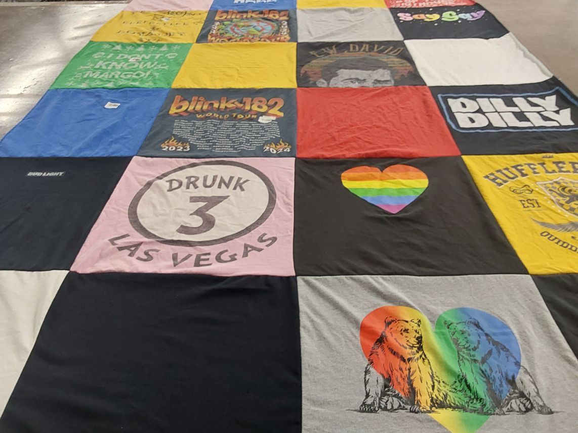 T-shirt quilt with music, entertainment themes by Camille from VA