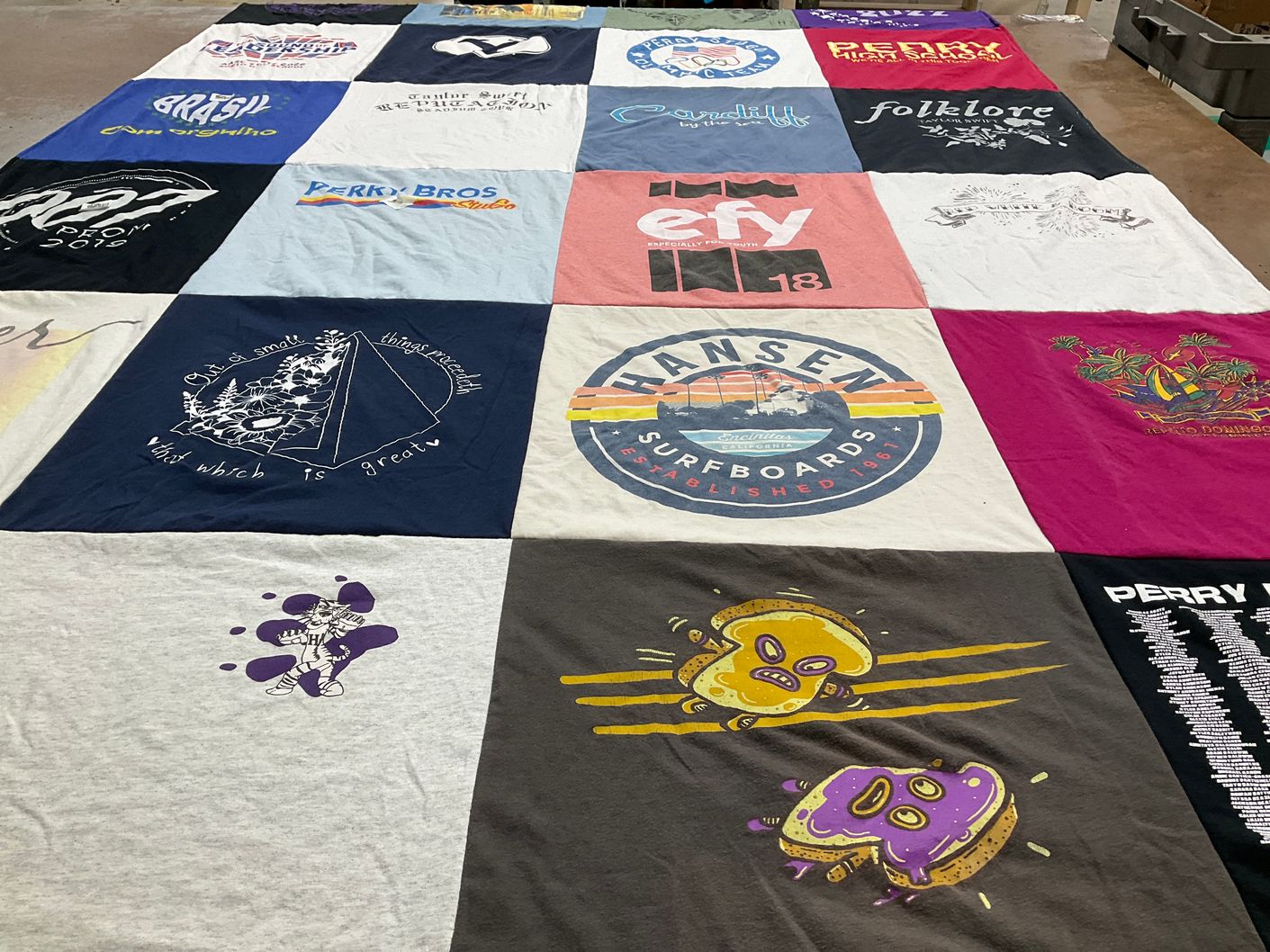 T-shirt quilt with music, surfing themes by Annette from CA