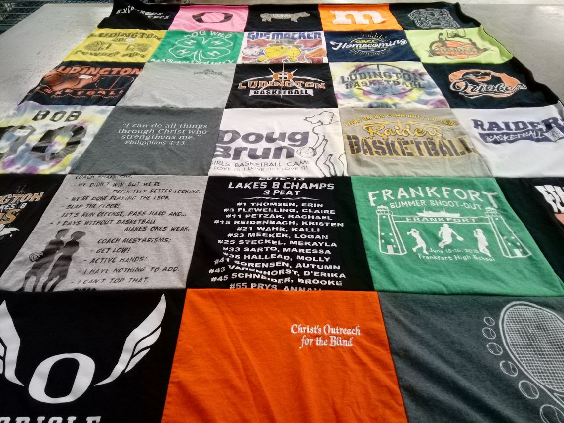 T-shirt quilt featuring ludington basketball, raider basketball by Claire from MI