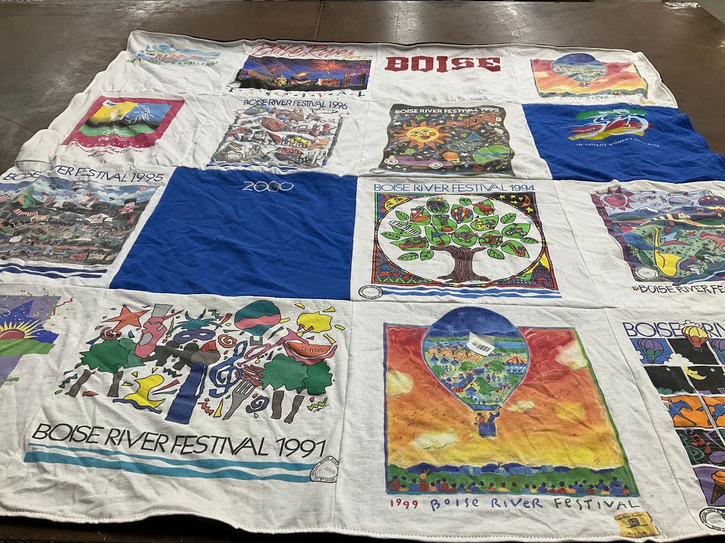 T-shirt quilt with community events, art themes by Maria from ID