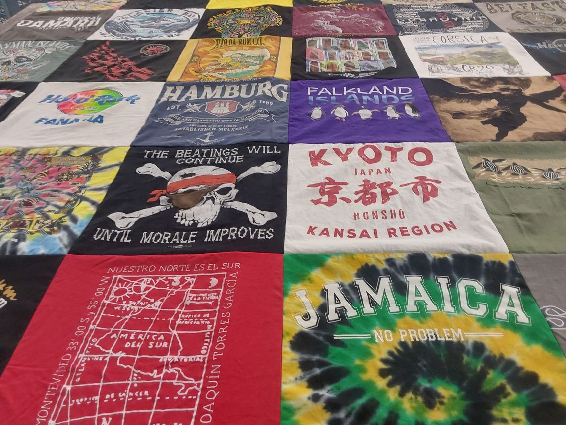 T-shirt quilt with travel, culture themes by Kenneth from WA