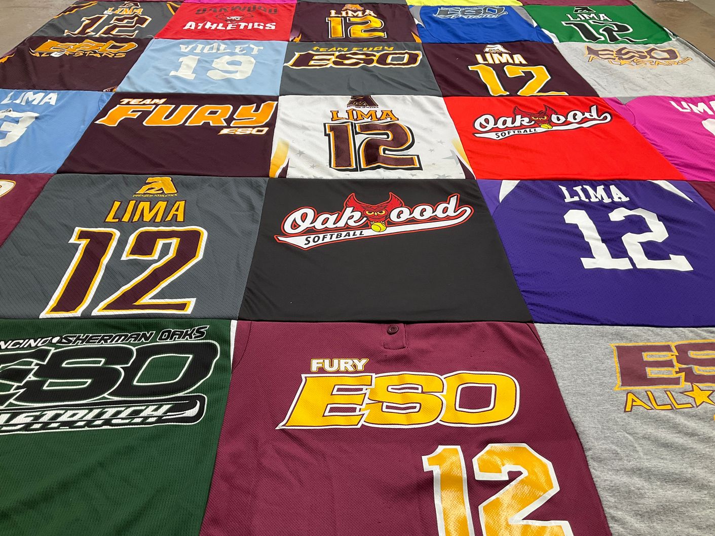 T-shirt quilt with softball, sports themes by Sarah from CA