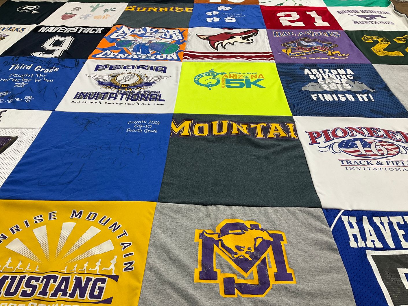 T-shirt quilt featuring haverstock high school, sunrise mountain mustangs by LAURA from VA