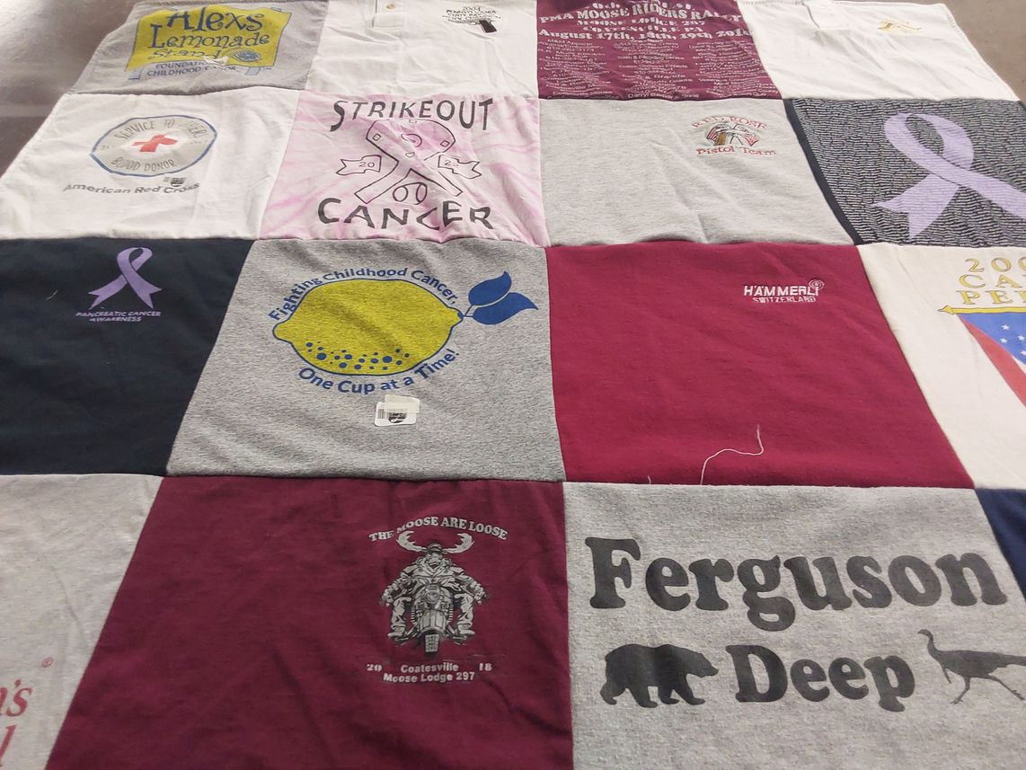 T-shirt quilt with childhood cancer awareness, cancer research themes by Leslie from PA