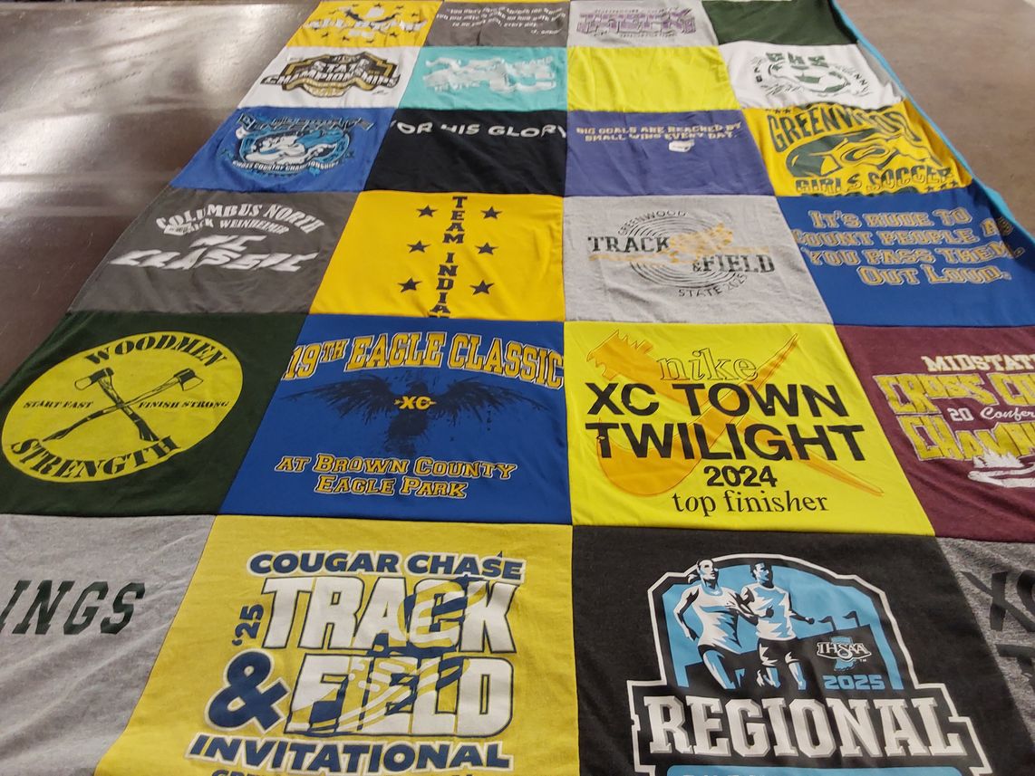 T-shirt quilt featuring cougar chase track and field, xctown twilight by Paulette from IN