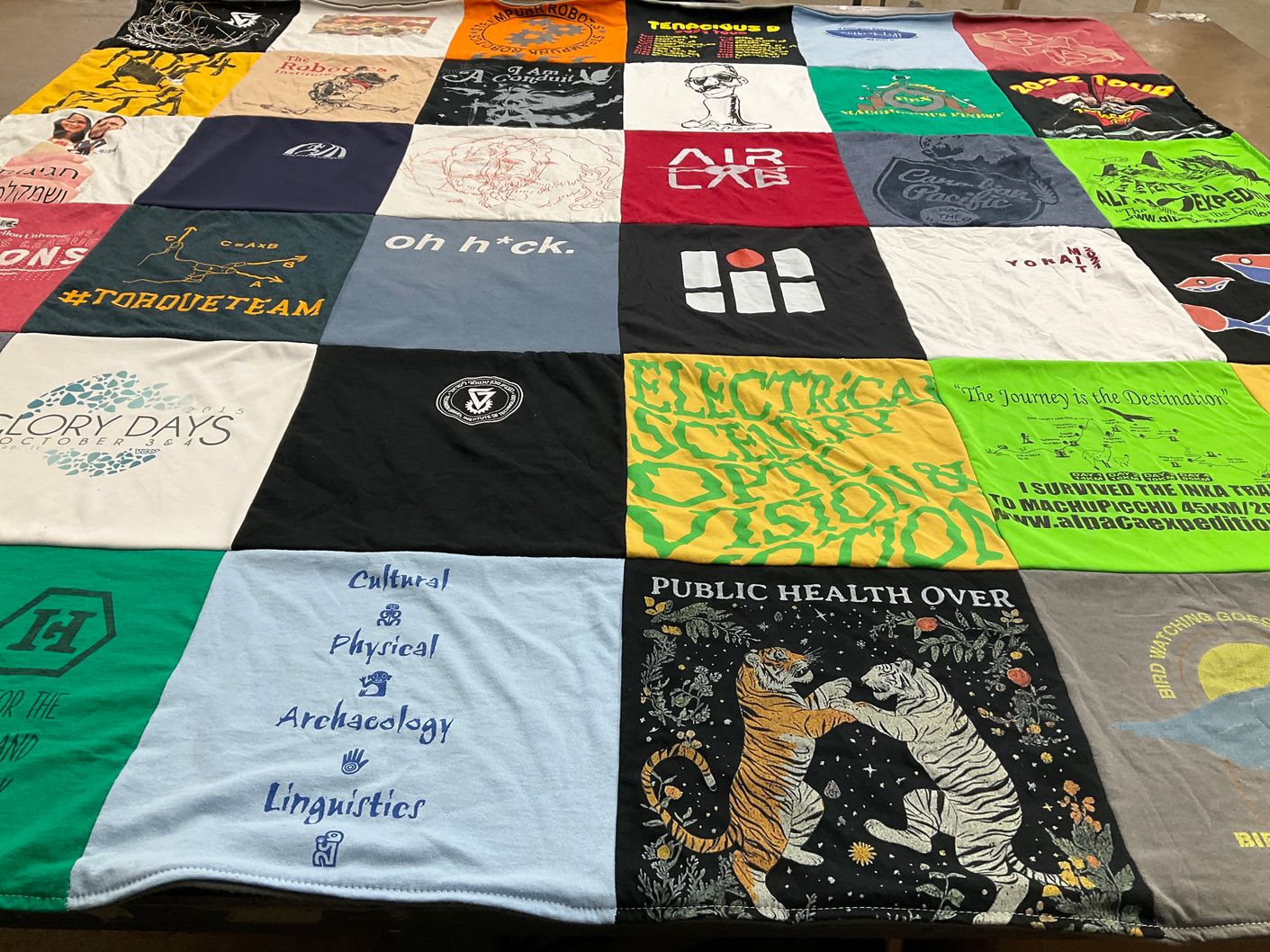 T-shirt quilt with health, education themes by Marisa from CA