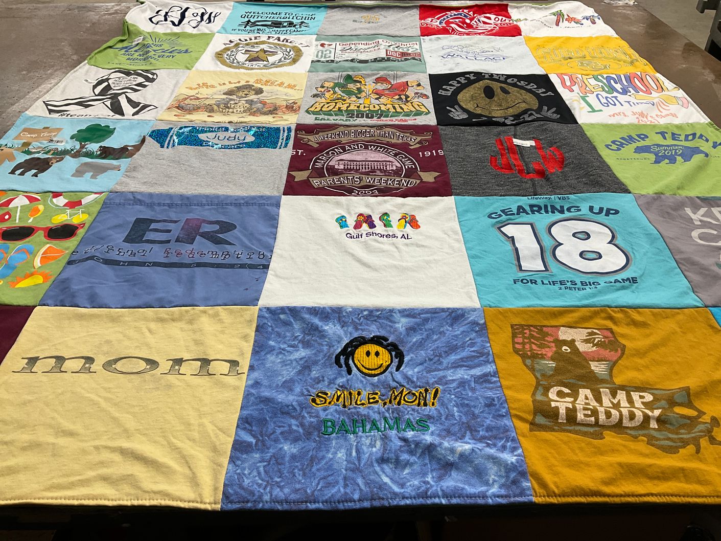 T-shirt quilt with camping, outdoors themes by Judy from LA