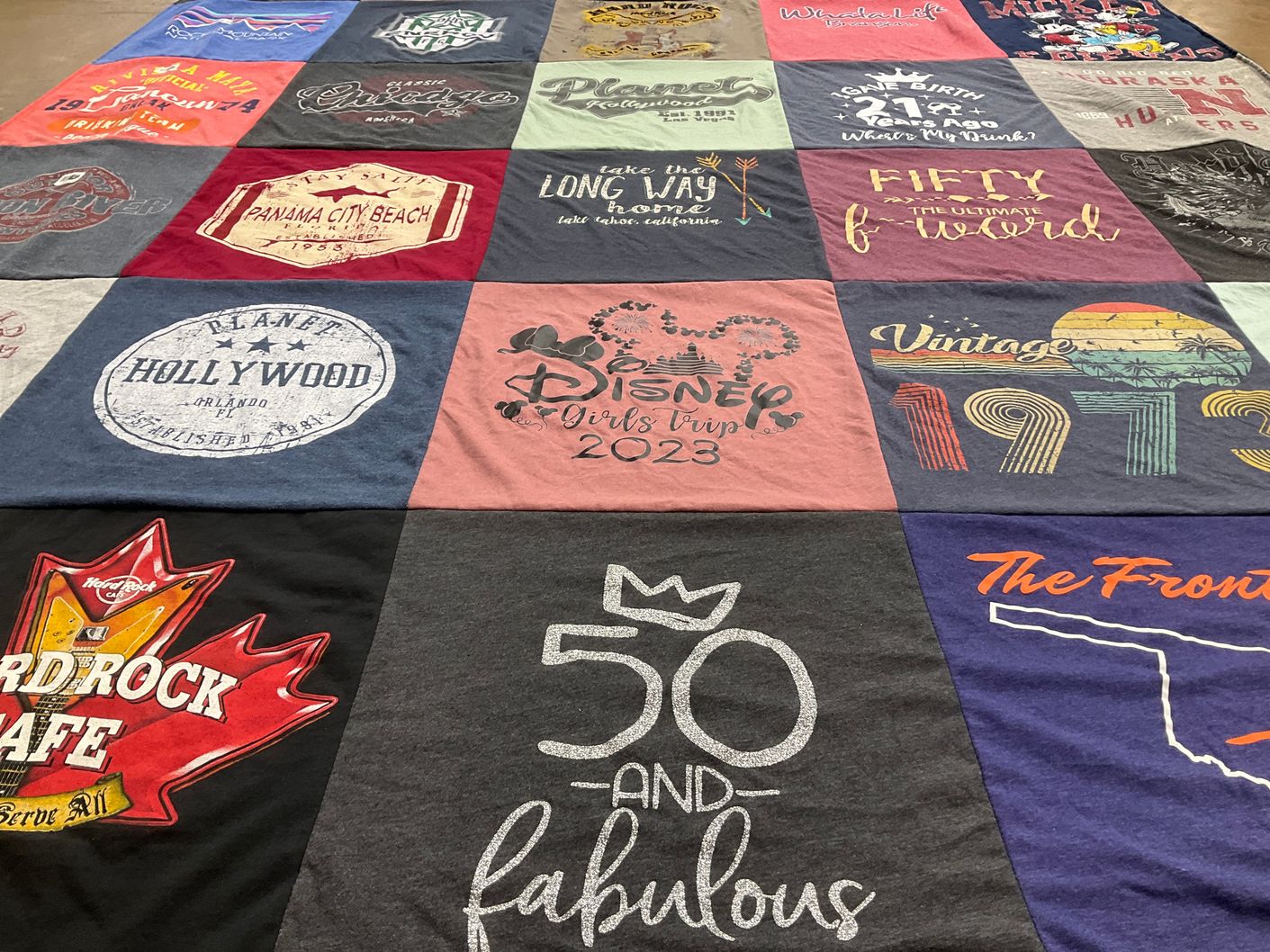 T-shirt quilt with travel, disney themes by Jona from OK